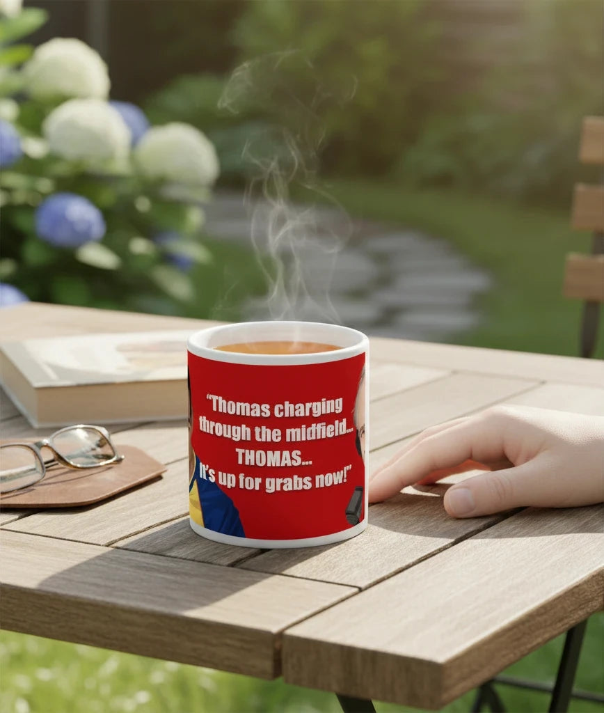 Retrotext 1989 football ceramic mug featuring iconic Brian Moore commentary on a red background on an outdoor table