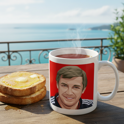 Retrotext 11oz glossy white mug featuring a Sir Alex Ferguson illustration, set on a wooden table with toast.