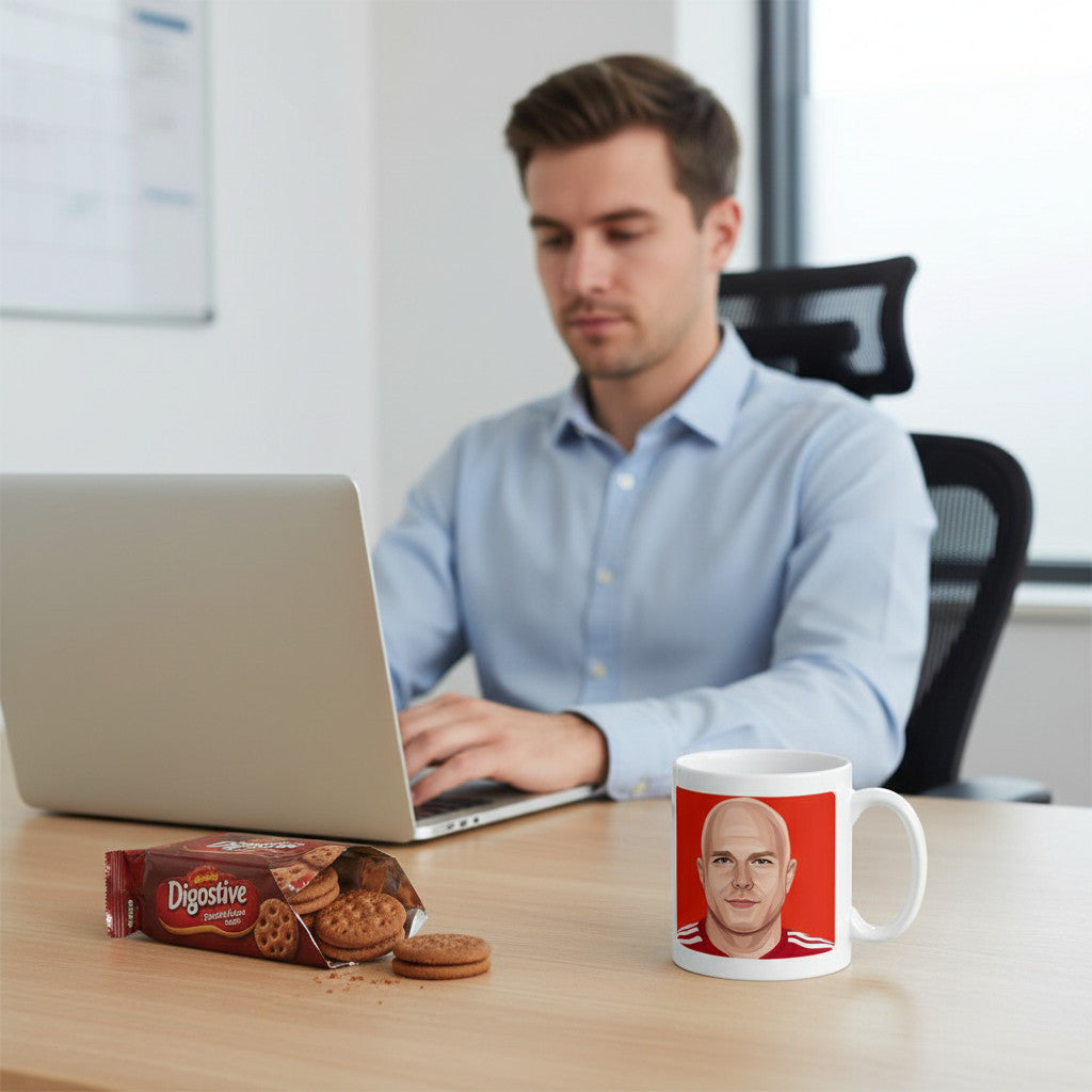 Retrotext Liverpool 2025 Premier League Champions Arne Slot ceramic mug on a desk next to a laptop and biscuits