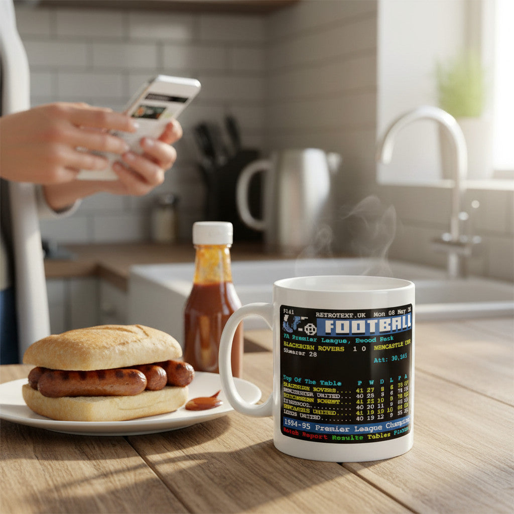 Retrotext Blackburn Rovers 1995 Premier League Champions teletext design mug on a kitchen table with a hot dog.