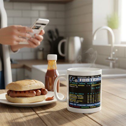 Retrotext Blackburn Rovers 1995 Premier League Champions teletext design mug on a kitchen table with a hot dog.