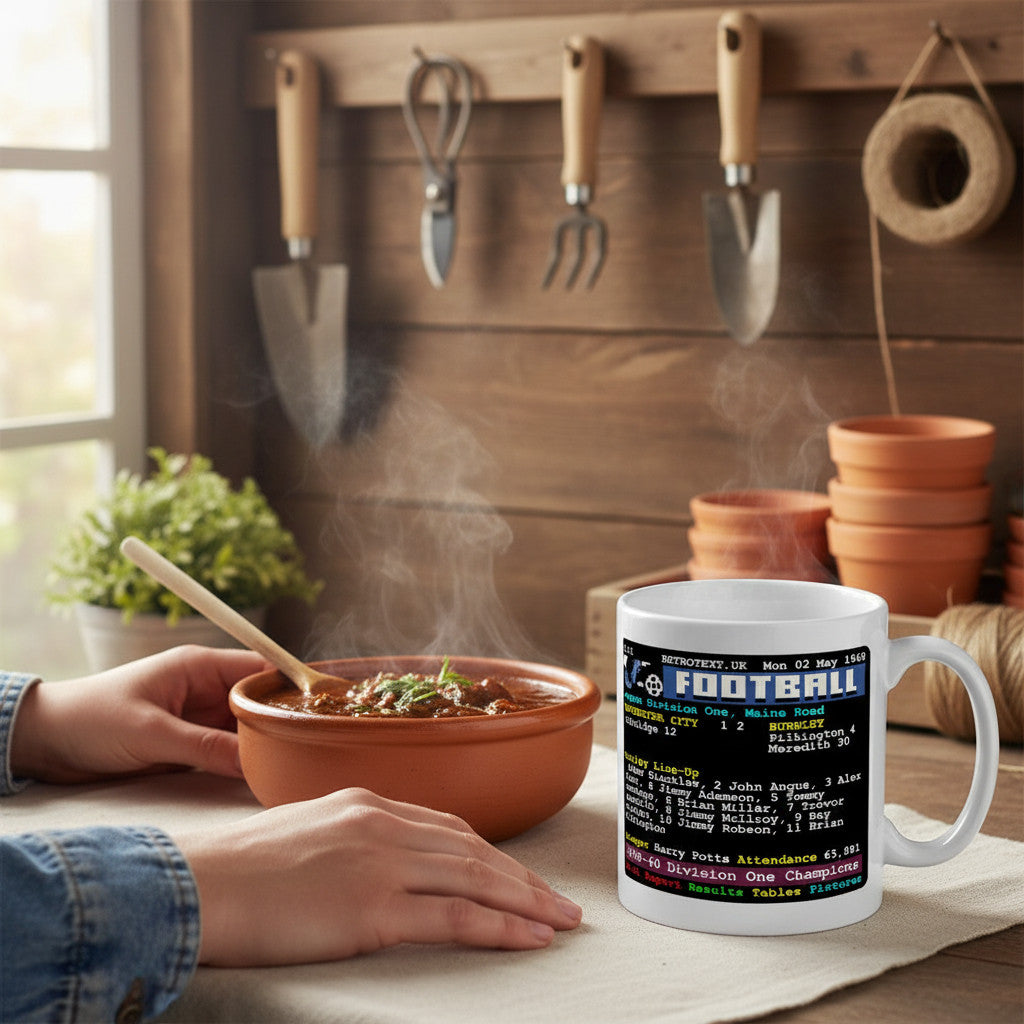Retrotext white ceramic mug featuring 1960 Burnley Division One Champions teletext design next to a bowl of soup.