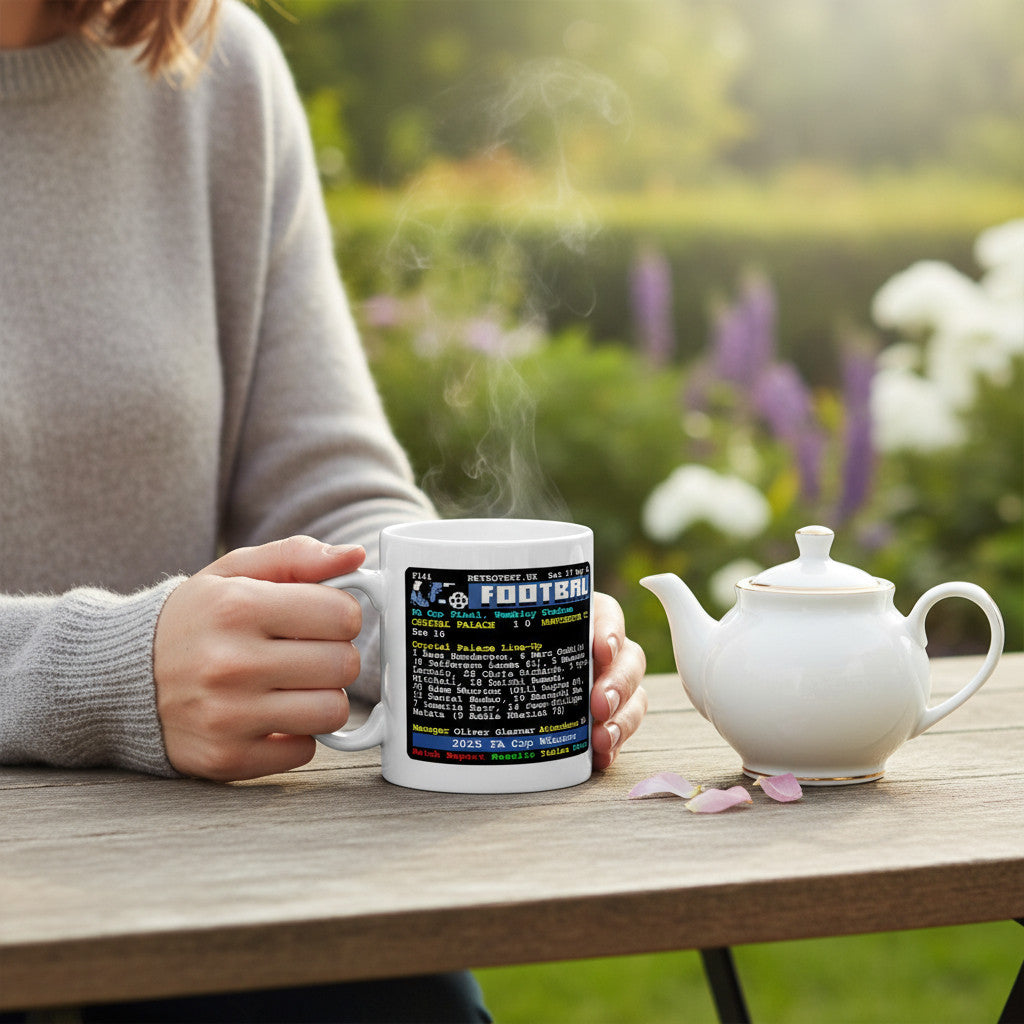 Retrotext 2025 Crystal Palace FA Cup winners ceramic mug held by a person at a wooden table with a teapot