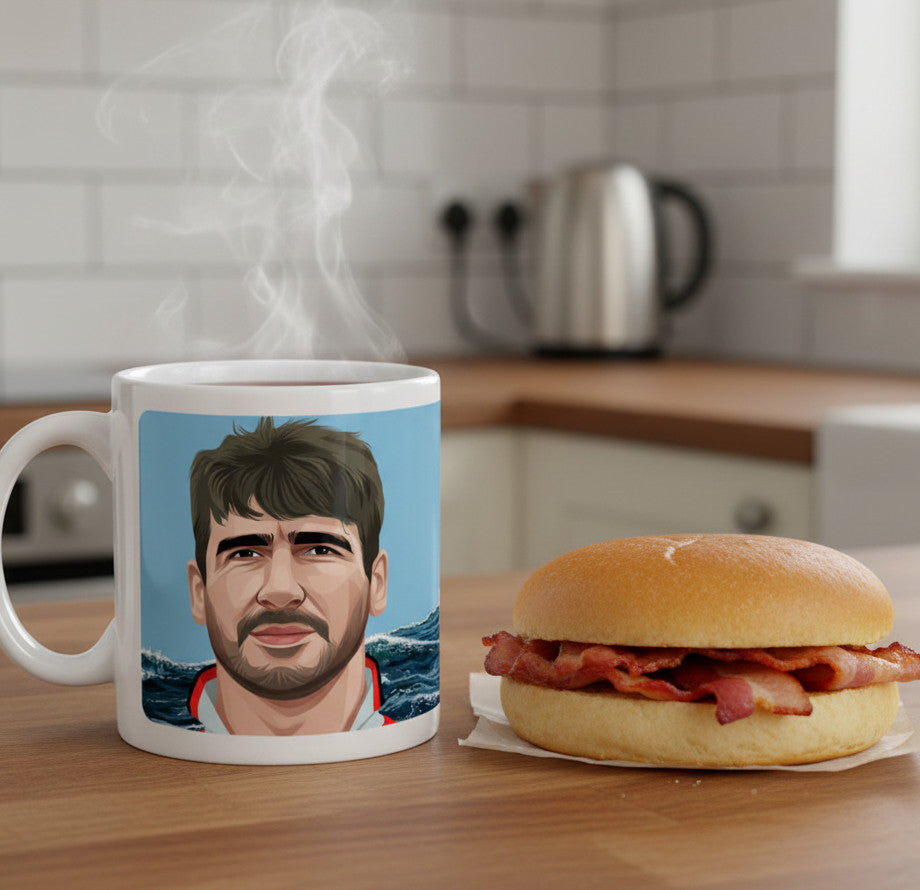 Retrotext 11oz glossy white ceramic mug featuring an Eric Cantona illustration with seagulls and ocean waves