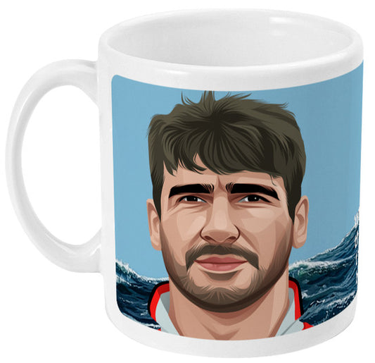 Retrotext 11oz glossy white ceramic mug featuring a stylized illustration of Eric Cantona with ocean waves background.