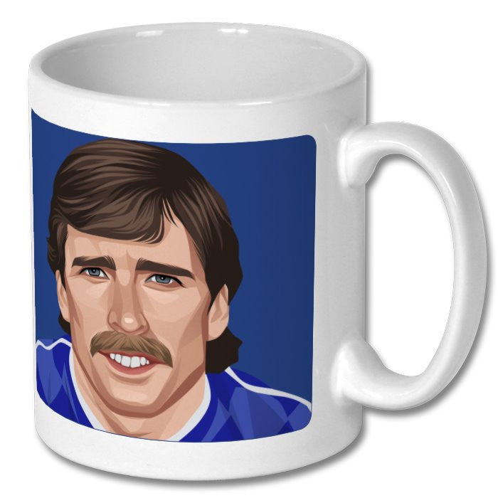 Retrotext white 11oz ceramic mug featuring a vintage illustration of an Everton 1987 player on a blue background.