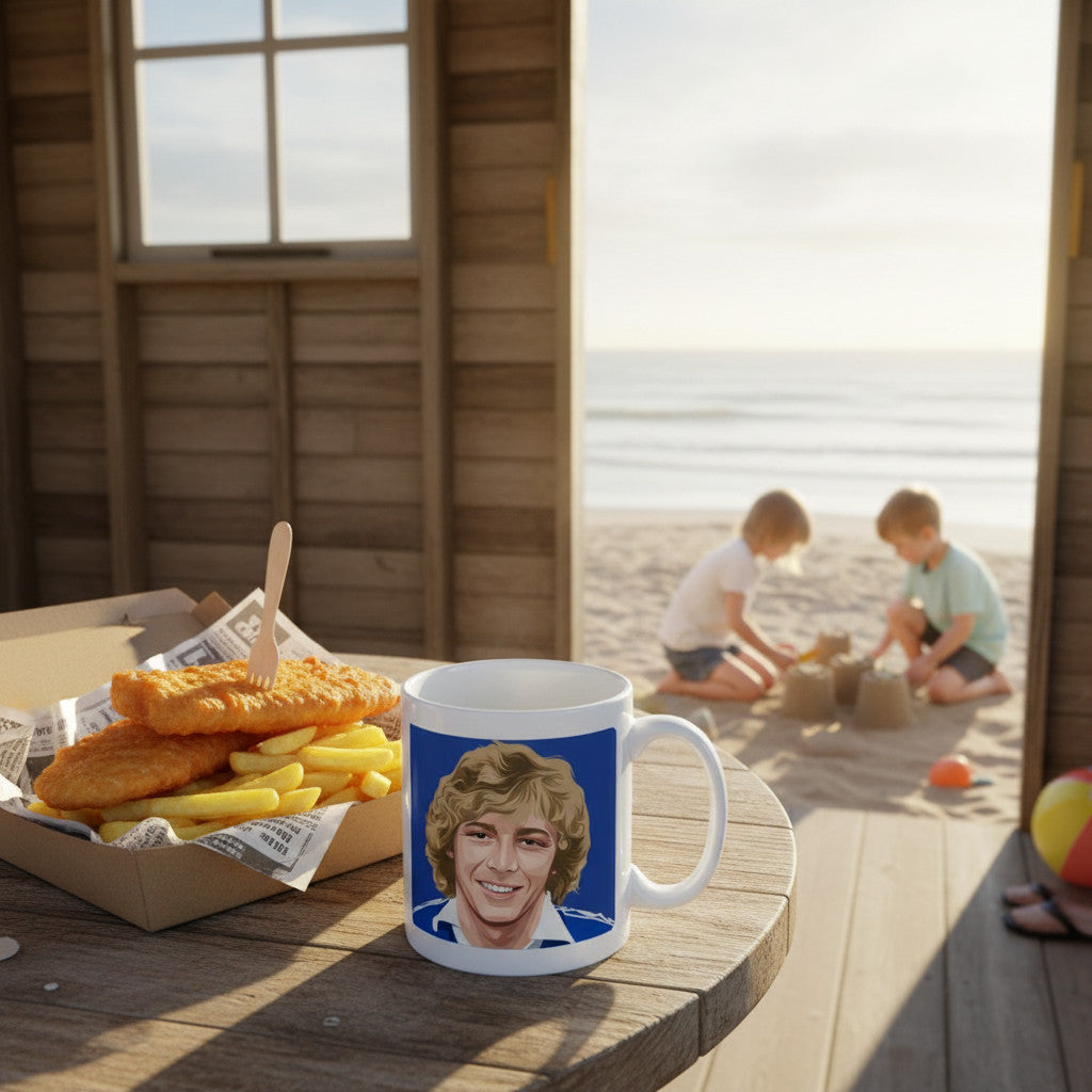 Retrotext Everton 1978 Andy King ceramic mug featuring a portrait graphic, sitting on a table with fish and chips.