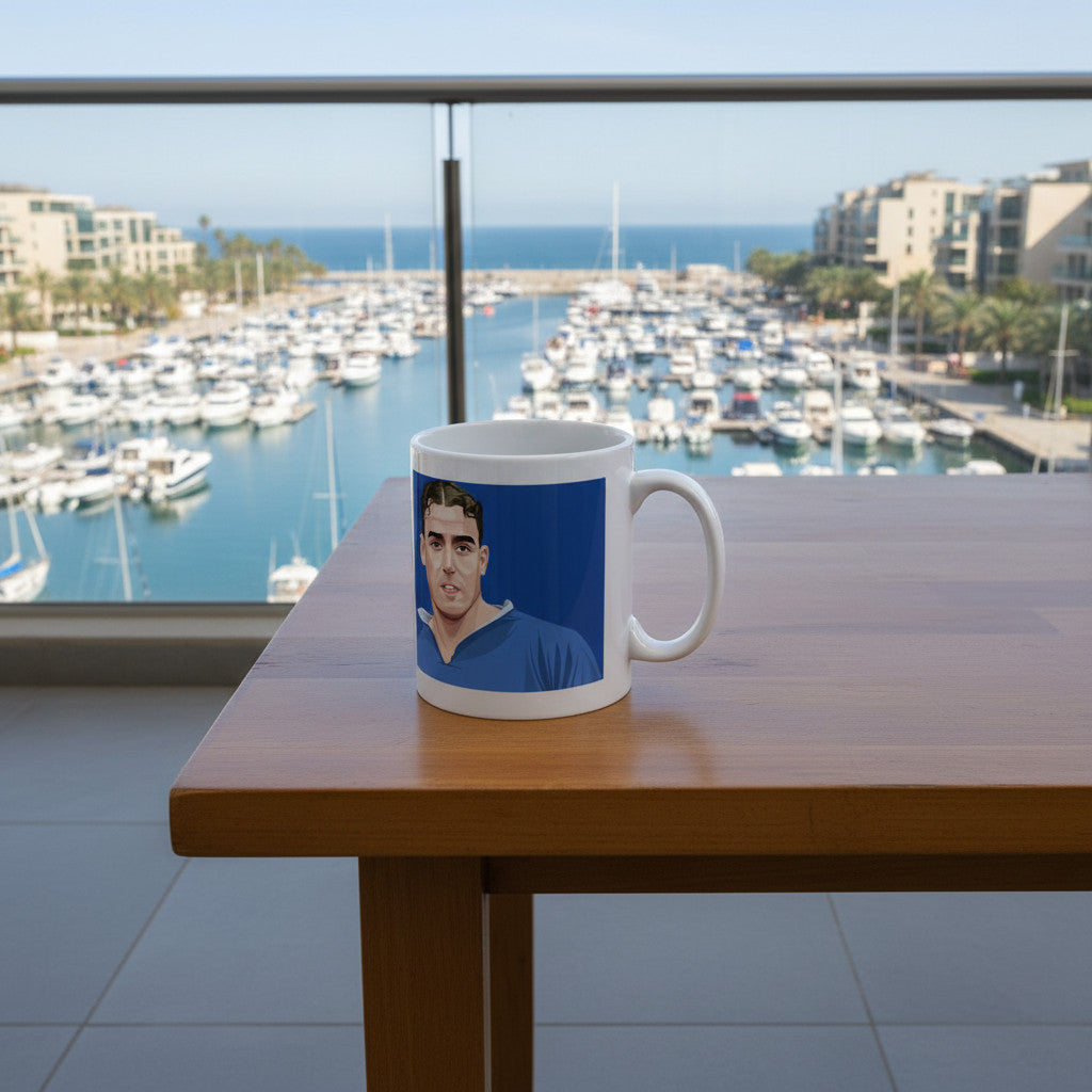 Retrotext Everton Dixie Dean ceramic mug featuring a portrait of the legendary footballer on a wooden table.