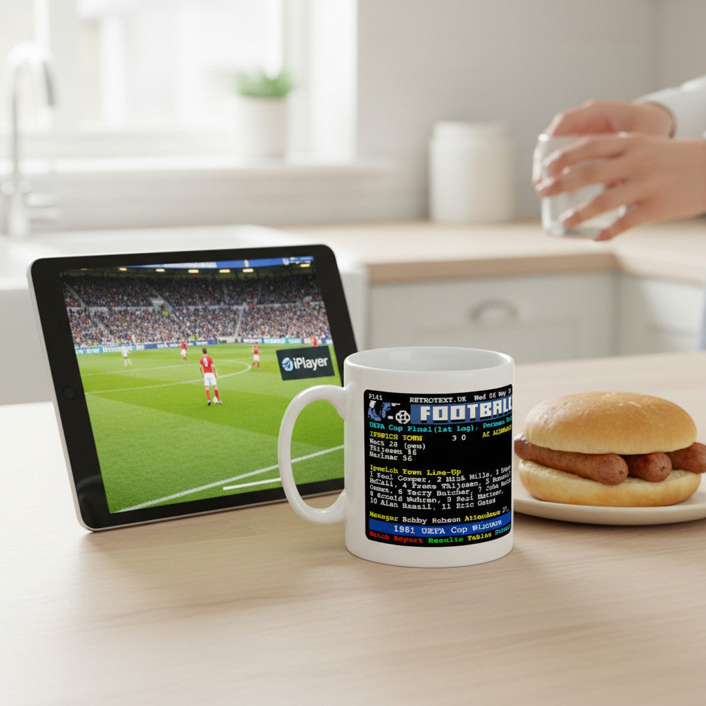 Retrotext ceramic mug featuring Ipswich Town 1981 UEFA Cup final teletext design on a kitchen table with a tablet