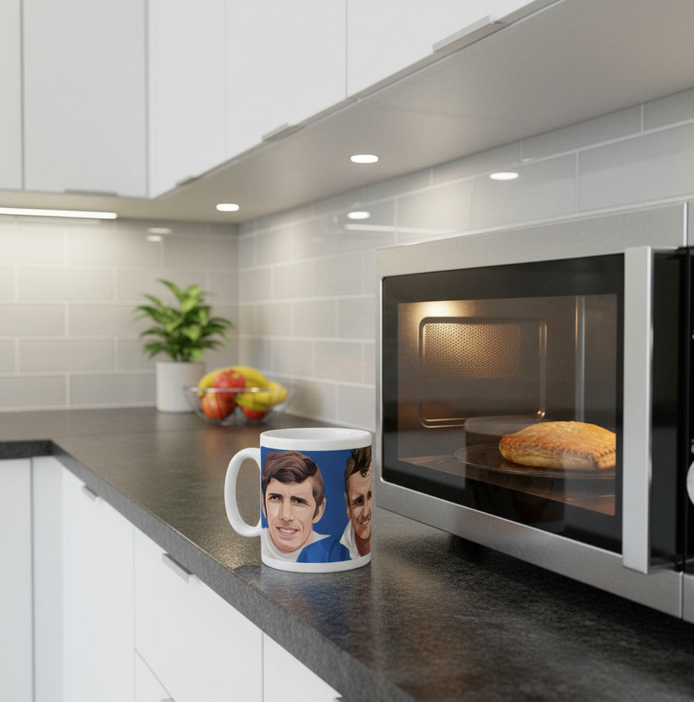 Retrotext Leeds United mug featuring Billy Bremner and Johnny Giles illustrations on a kitchen counter by a microwave