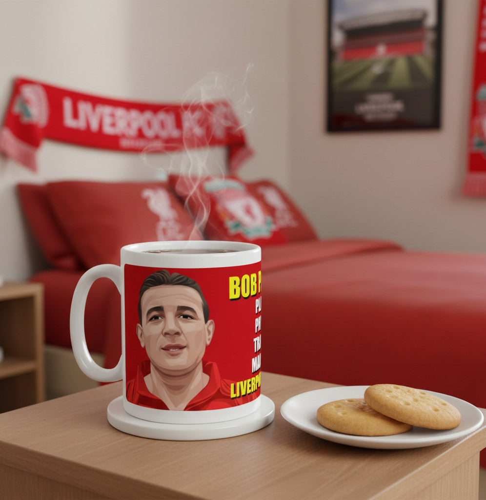 Retrotext Liverpool FC Bob Paisley wraparound ceramic mug with a glossy white finish on a wooden table with biscuits.