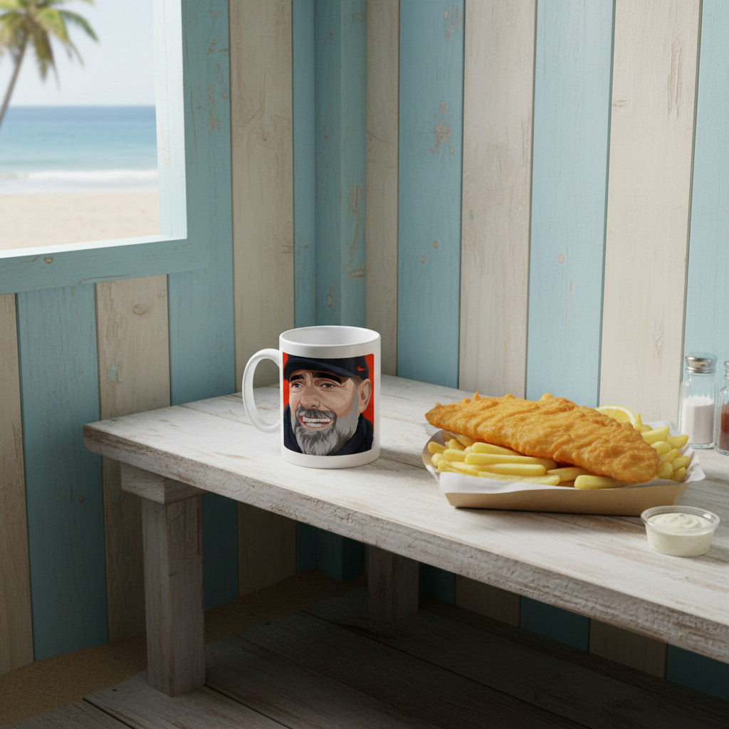 Retrotext Liverpool 2024 Carabao Cup Winners Jurgen Klopp mug on a wooden table next to a plate of fish and chips.