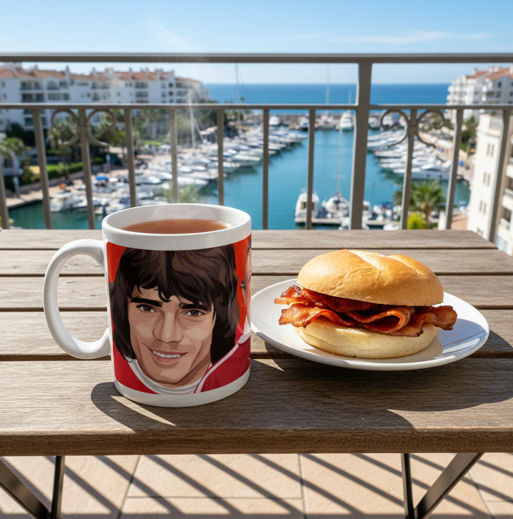 Retrotext Liverpool Keegan Paisley Dalglish glossy white ceramic mug featuring Kevin Keegan on a balcony with breakfast