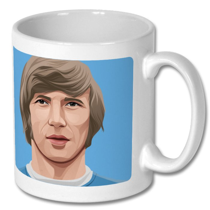 Retrotext Manchester City 1970 League Cup ceramic mug featuring a vintage player illustration on a blue background