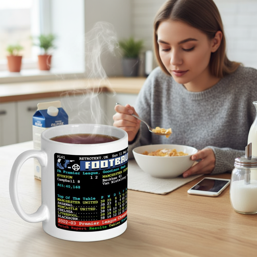 Retrotext Manchester United 2003 Premier League Champions ceramic mug with teletext graphic on a kitchen table
