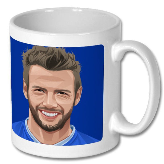 Retrotext ceramic mug featuring a vibrant illustration of Ipswich Town legend Marcus Stewart on a blue background