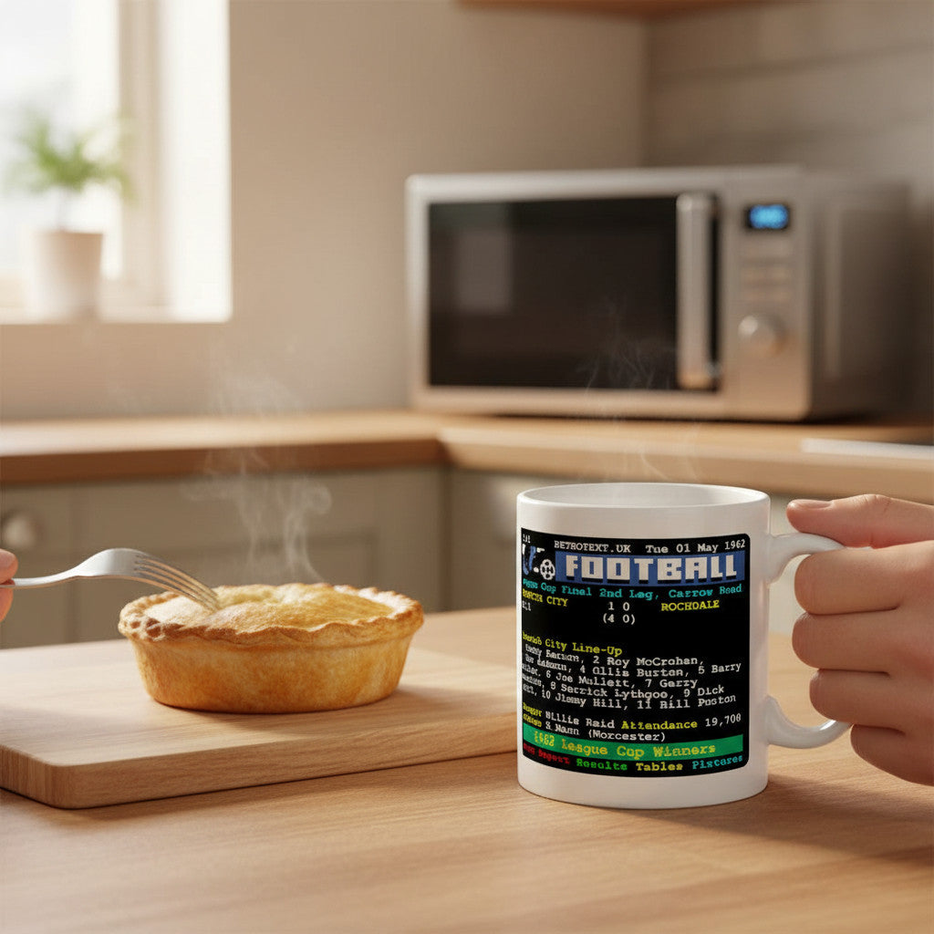 Retrotext Norwich City 1962 League Cup Winners ceramic mug with retro teletext football graphics on a kitchen table