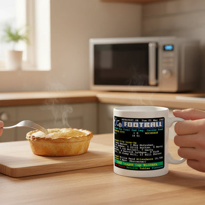 Retrotext Norwich City 1962 League Cup Winners ceramic mug with retro teletext football graphics on a kitchen table