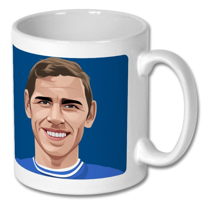 Retrotext ceramic mug featuring a portrait illustration of Ray Crawford in a blue Colchester United kit