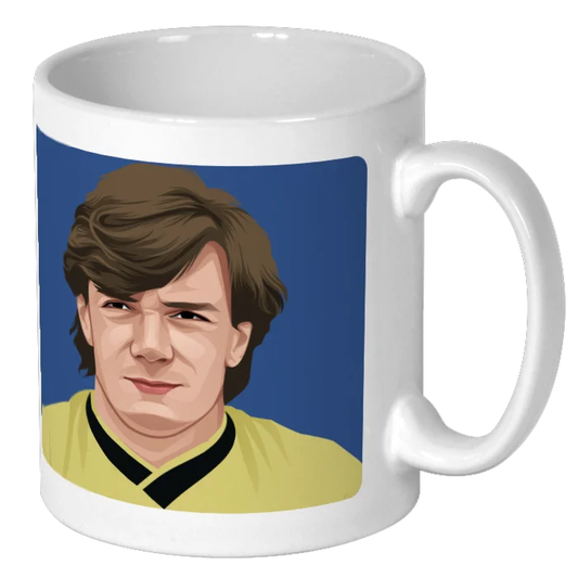 Retrotext ceramic mug featuring a retro illustration of Ray Houghton in his yellow Oxford United kit
