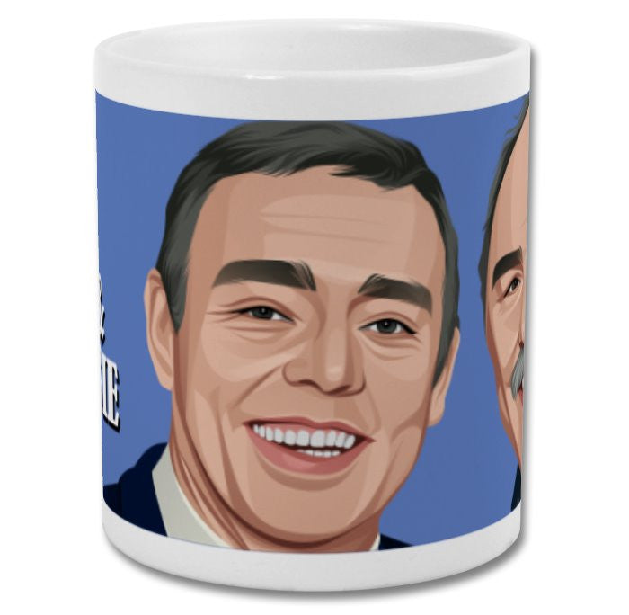 Retrotext Saint and Greavsie 11oz glossy white ceramic mug featuring a cartoon illustration of the football duo.