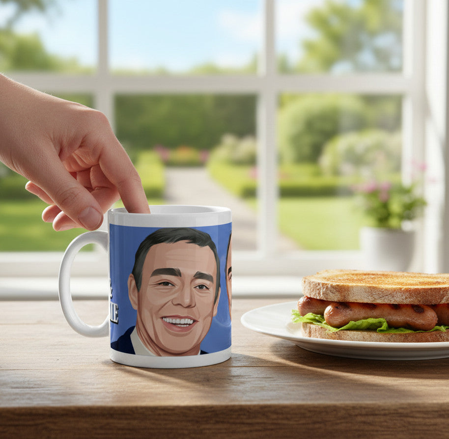 Retrotext Saint and Greavsie 11oz glossy white ceramic mug featuring a cartoon portrait of Ian St John