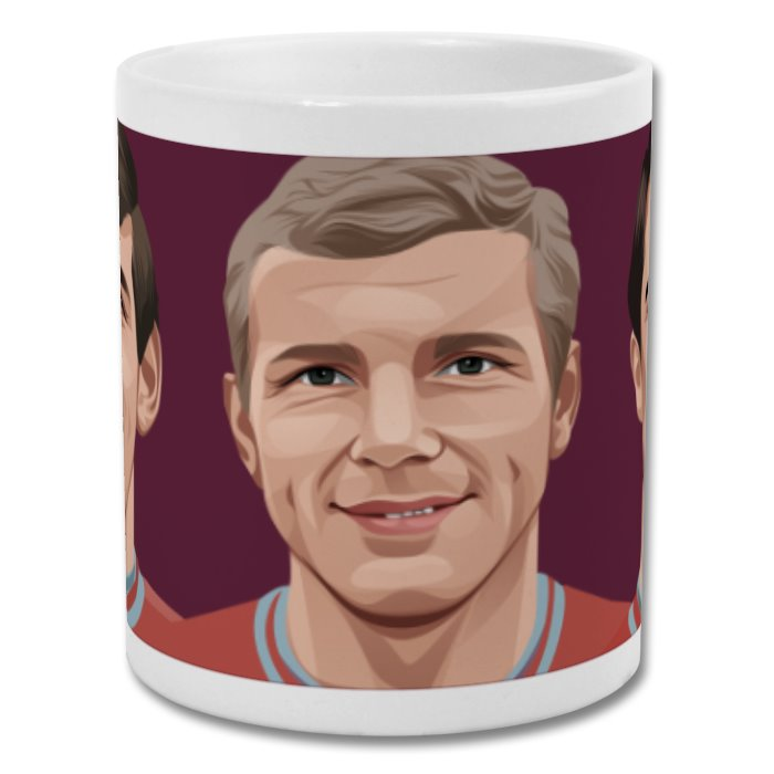 Retrotext West Ham United mug featuring illustrated portraits of football legends Peters, Moore, and Hurst.