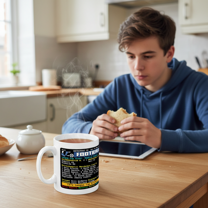 Retrotext Wolverhampton Wanderers 1974 League Cup ceramic mug with teletext design on a table with a young man